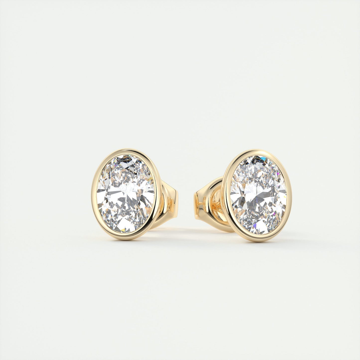 1.0 CT Oval Bezel Solitaire CVD F/VS Diamond Earrings